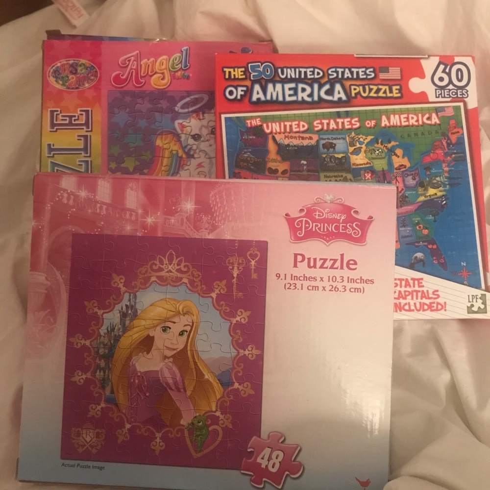 Set of 3 Puzzles (all unopened)